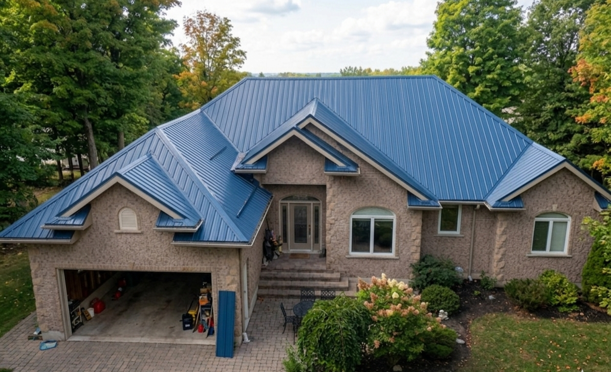 Front aerial view of a brick estate home with a blue steel roof.